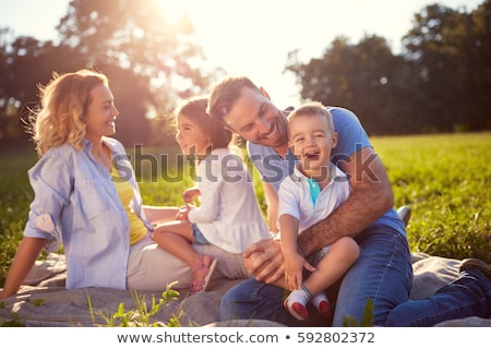 Foto stock: Happy Family Having Picnic In The Park