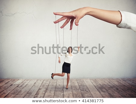 Foto stock: Business Woman Puppeteer