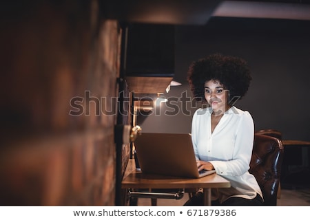 Stockfoto: Woman Using Laptop Late At Night