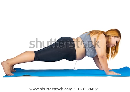 Stock fotó: Young Woman Doing Push Ups