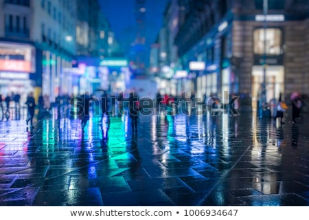 Zdjęcia stock: People Crowd Walking In The City At Night Blurred Scene