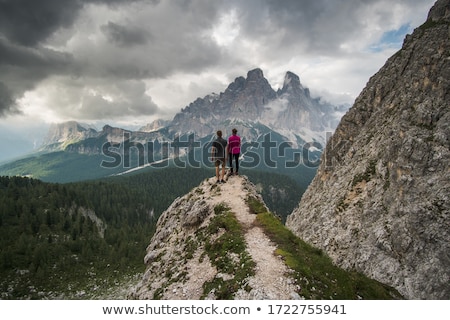Stok fotoğraf: Couple Standing On Mountain Top