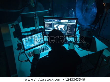 Stok fotoğraf: Ransomware Computer Virus Concept Hacker With Monitor