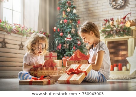 Сток-фото: Girls Opening Christmas Gifts