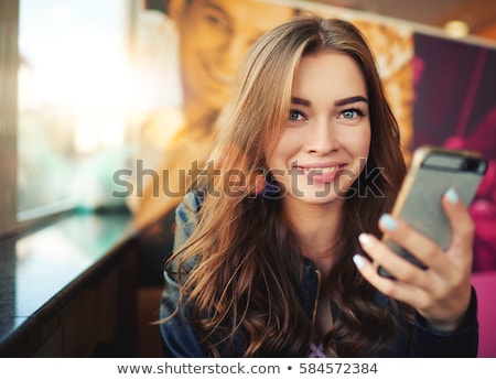 Stock photo: Girl With Smartphone In Free Time