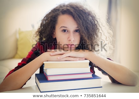 Stok fotoğraf: Curly Hair Teen Girl Rest From Learning On Books