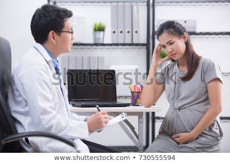Stockfoto: Pregnant Woman Visiting Psychologist Doctor