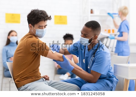Сток-фото: Doctor Injecting Patient With Coronavirus Vaccine