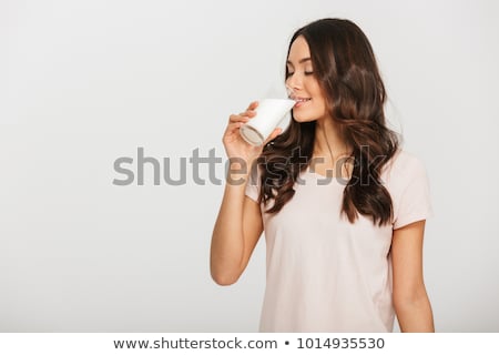 Stock fotó: Girl Is Drinking Milk