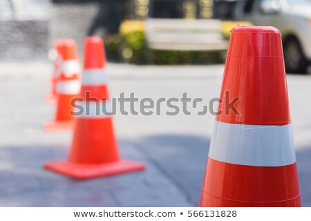 ストックフォト: Road Barrier With Traffic Cone