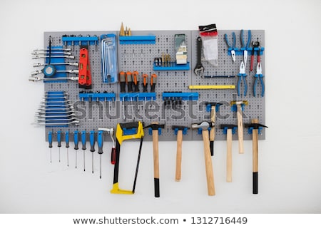 Stock foto: Pliers And Tools Hanging On Wall
