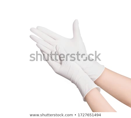 Zdjęcia stock: Putting On Latex Gloves