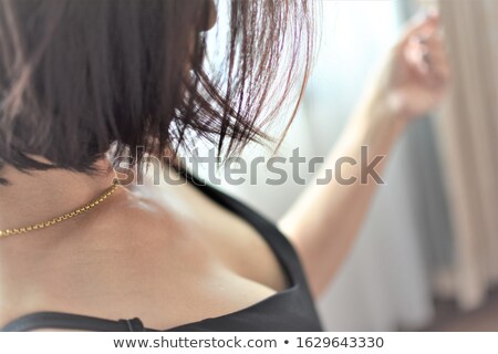 Stock photo: Close Up Picture Of Thoughtful Brunette Woman