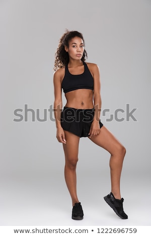 Zdjęcia stock: Full Length Portrait Of An Afro American Young Sportswoman