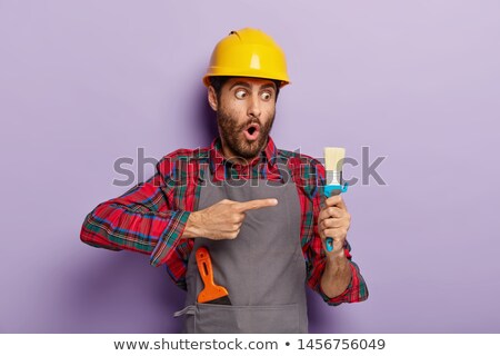 Stock photo: Craftsman Painter Pointing At Something