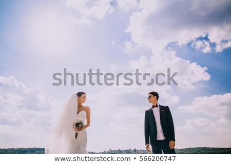 Сток-фото: Young Couple Dancing Near The Ocean At Sunset