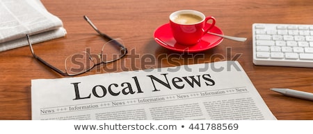 Foto stock: A Newspaper With The Headline Local News