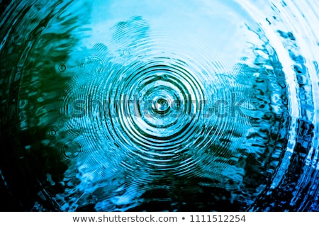 Stock fotó: The Spiral Pattern Of Water Drops