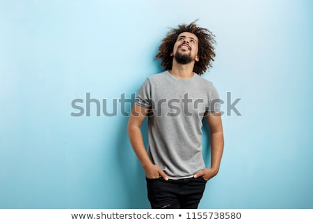 [[stock_photo]]: Man Curled Up With His Hands In His Face