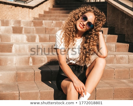 Сток-фото: Fashionable Sexy Girl Sitting On Urban Street