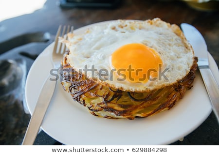 Foto stock: Potato Pancakes With Eggs And Ham