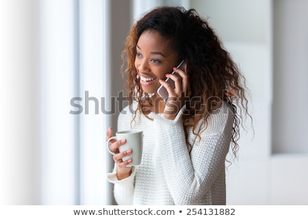 Stock photo: Young Woman Talk On A Cellular Telephone