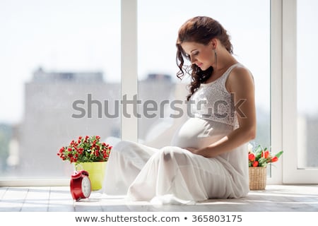 Foto d'archivio: Beautiful Portrait Of Young Pregnant Woman