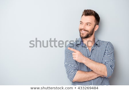 Stock photo: Handsome Young Man Pointing