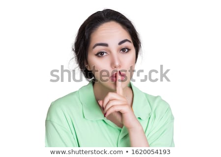 Stock photo: Woman Asking For Silence Against A White Background