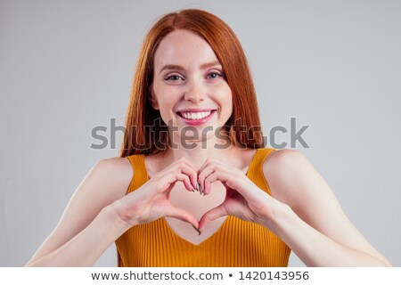 Stock photo: Girl With Red Hair And Heart