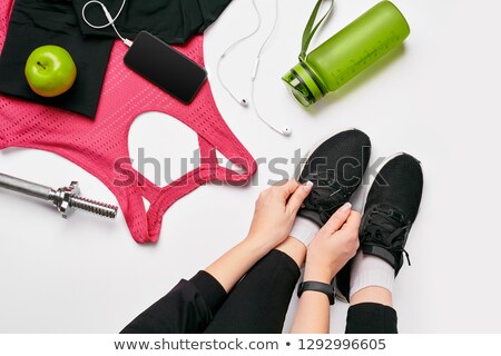 Сток-фото: Athletic Young Woman Works Out With Green Dumbbells