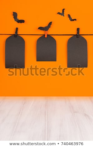 Foto stock: Halloween Black Blank Labels Tomb On Orange Background Mock Up