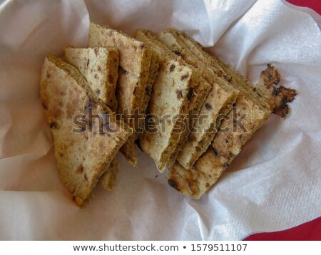 [[stock_photo]]: Sesame Oil And Bread In Wicker Basket