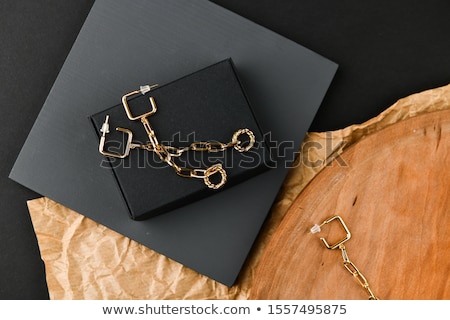 Stockfoto: The Beautiful Woman In Expensive Pendant Close Up