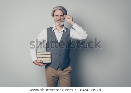 ストックフォト: Man With Book Isolated On White Background