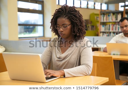 Stock photo: Serious Trainee Sitting In Classroom