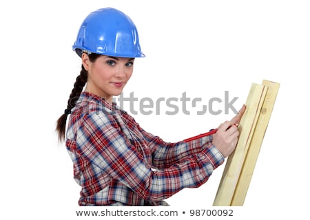 Stock photo: Craftswoman Taking Measurements