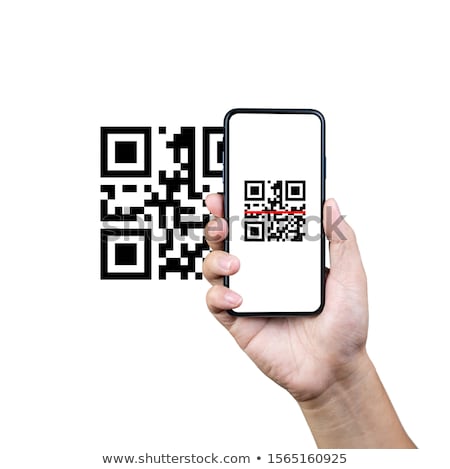 Foto stock: Hand With Mobile Phone Scanning Qr Code