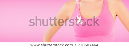 Stockfoto: Mid Section Of Standing Woman For Breast Cancer Awareness On White Background