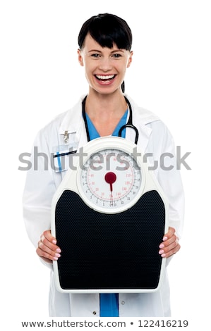 Zdjęcia stock: Stethoscope On Weighing Scales