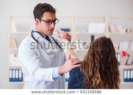 Stock fotó: Female Patient At Orthopedic Doctor Medical Exam For Wrist Injur