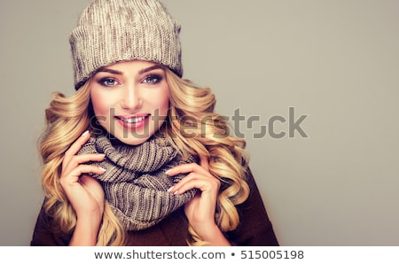 Stock photo: Portrait Of A Young Pretty Girl In Sweater And Scarf