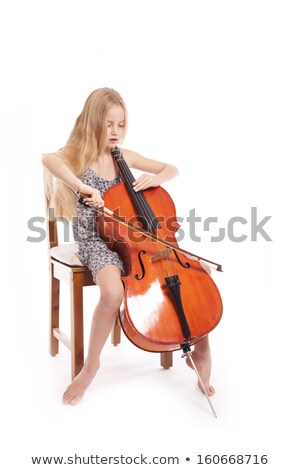 Сток-фото: Girl Playing Cello On The Chair