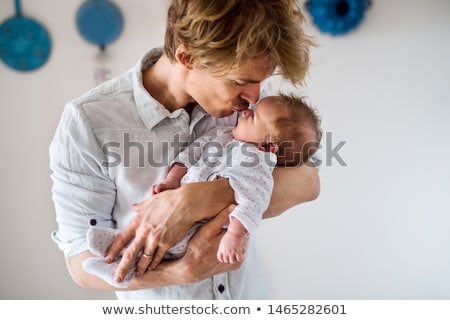 Stock photo: Father Kissing Little Baby Daughter