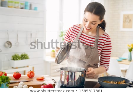 Stock photo: Woman Is Preparing Proper Meal