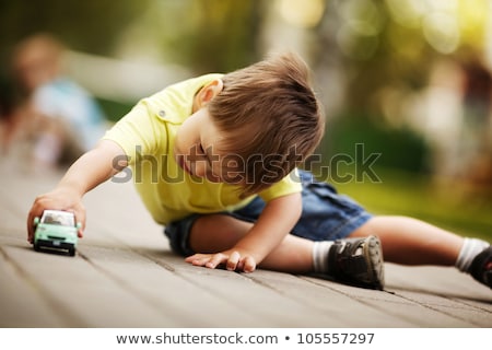 Stock photo: Little Boy Playing With Toys