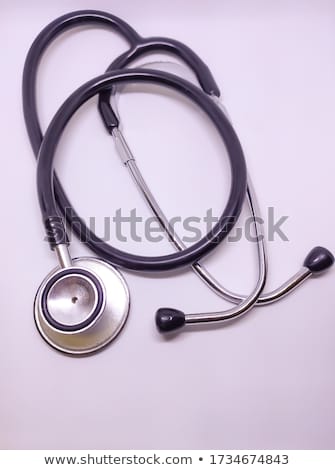 Foto d'archivio: Focus Of Medical Instruments Stethoscope And Doctor Touching Pa