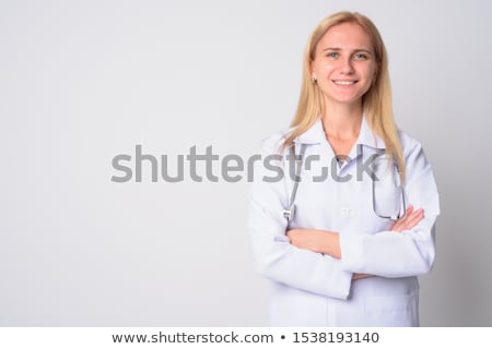 Foto d'archivio: Young Blonde Attractive Doctor With Arms Crossed