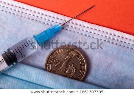 [[stock_photo]]: Plastic Disposable Syringe Filled With Red Liquid