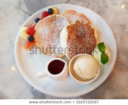 [[stock_photo]]: Tasty Sweet Pancakes With Vanilla Icecream And Topping